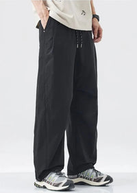 Comfy Y2K Parachute Trousers — dettaglio della stampa