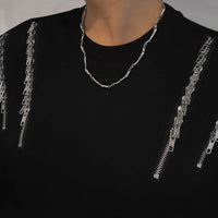 Connected Bones Metal Necklace — dettaglio della stampa