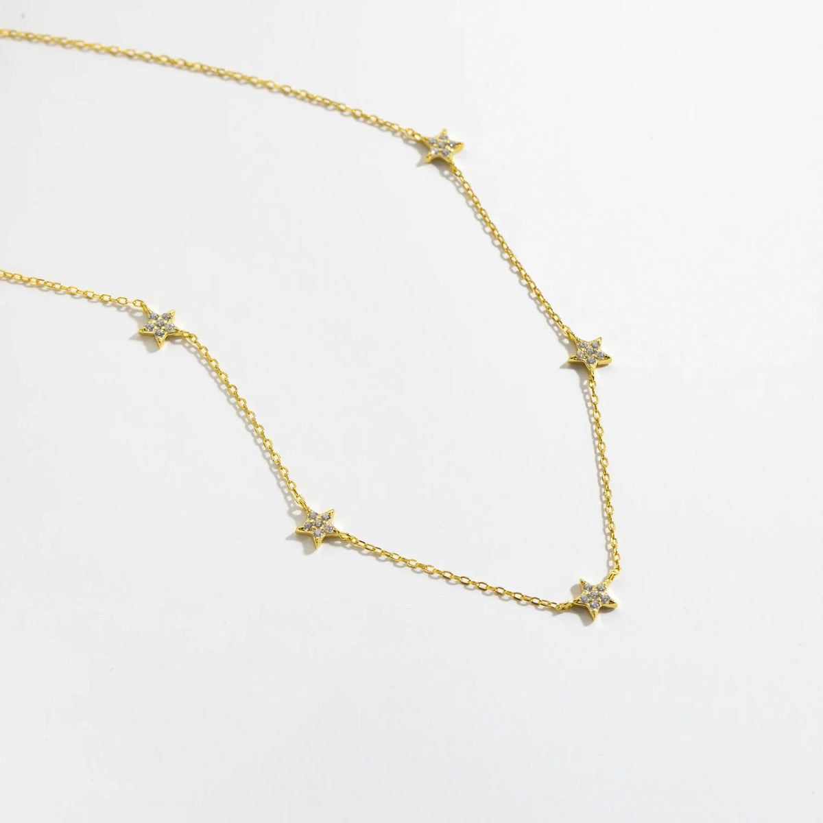 Dainty Stair Charm Jewellery — dettaglio del tessuto