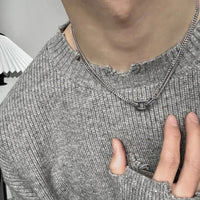 Locked Links Pendant Necklace — dettaglio della stampa