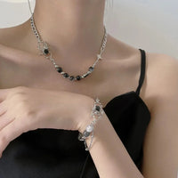Matching Spider Necklace and Band — vista laterale