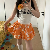Orange Y2K High Waist Puffy Floral Mini Skirt — vista frontale