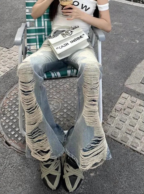 Ultra Distressed Y2K Skinny Flare Low Waisted Jeans — in alternativa