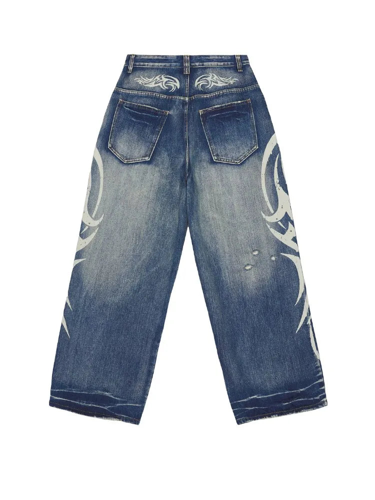 Vintage Y2K Ripped Tribal Graphic Baggy Jeans — vista laterale