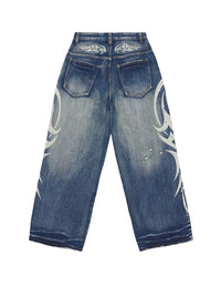 Vintage Y2K Ripped Tribal Graphic Baggy Jeans — vista laterale