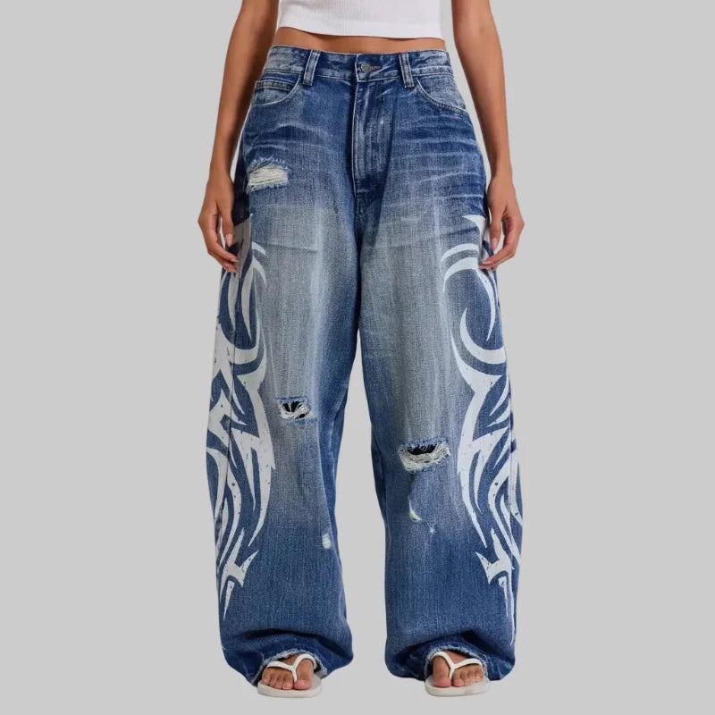 Vintage Y2K Ripped Tribal Graphic Baggy Jeans — vista frontale