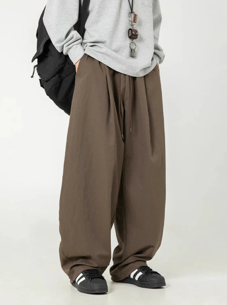 Wide Leg Curved Y2K Parachute Trousers — vista laterale