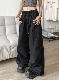 Wide Leg Y2K Parachute Trousers — vista laterale