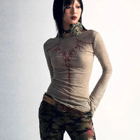 Womens Spinal Print Y2K Bell Long Sleeve Top — vista frontale