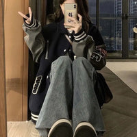 Baggy Fit Black And Grey Varsity Jacket — in alternativa