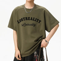 Baggy "Lost Reality" Graphic T Shirt — in alternativa