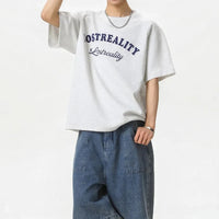 Baggy "Lost Reality" Graphic T Shirt — dettaglio del tessuto