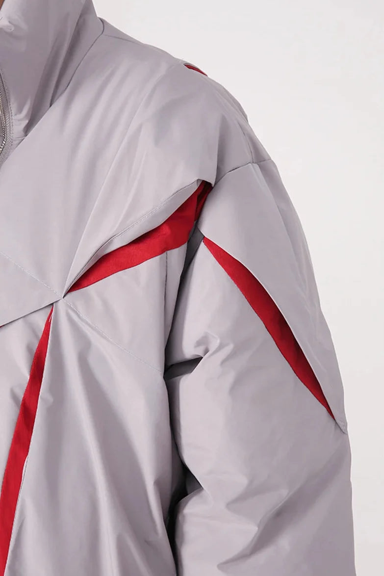 "Carved Apart" Padded Coat — dettaglio del tessuto