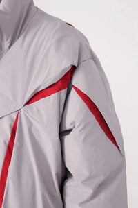 "Carved Apart" Padded Coat — dettaglio del tessuto