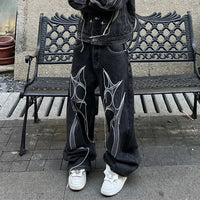 Cyber Embroidery Stacked Baggy Jeans — dettaglio