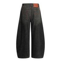 Dark Leopard Print Baggy Denim Curved Barrel Jeans — dettaglio della stampa