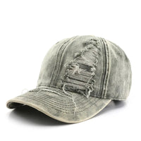 Distressed Baseball Cap — dettaglio del tessuto