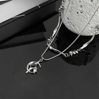 Double Layer Moon And Star Black Pearl Necklace — dettaglio della stampa