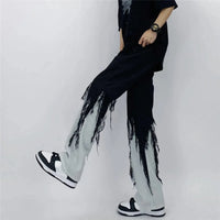 Dripped Tassel Patchwork Jeans — in alternativa
