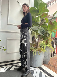 "Dripping Smiles" High Waist Jeans — in alternativa