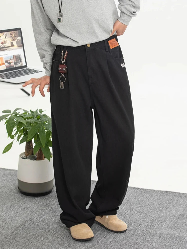 Embroidered Black Baggy Jeans — vista frontale