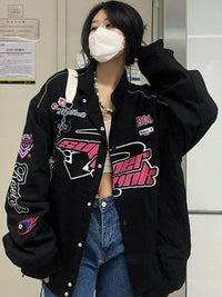 Embroidered Graphic Varsity Jacket — dettaglio della stampa