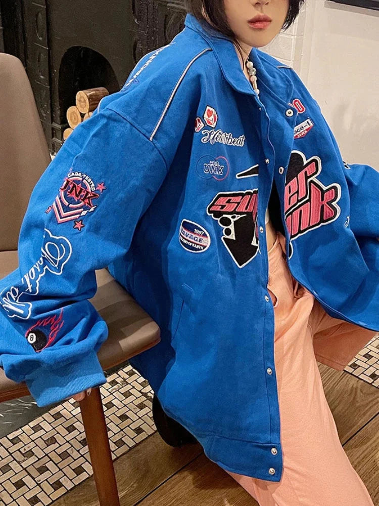 Embroidered Graphic Varsity Jacket — dettaglio del tessuto