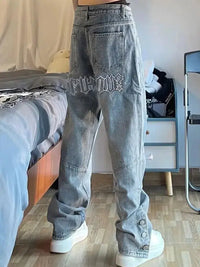 Embroidered Light Blue Baggy Jeans — vista frontale