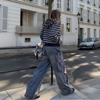 Flame Outline Baggy Embroidered Jeans — vista frontale