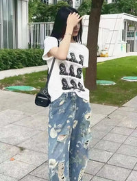 Graphic Floral Print Distressed Baggy Jeans — vista posteriore