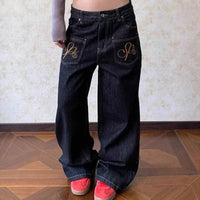 Grunge Wings Embroidered Graphic Baggy Low Rise Jeans — vista posteriore