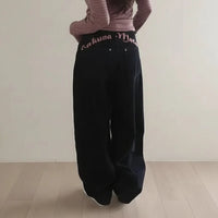 "Hukuna Matata" Vintage Embroidered Letter Black Baggy Jeans — vista posteriore