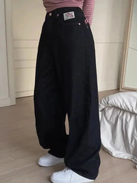 "Hukuna Matata" Vintage Embroidered Letter Black Baggy Jeans — dettaglio
