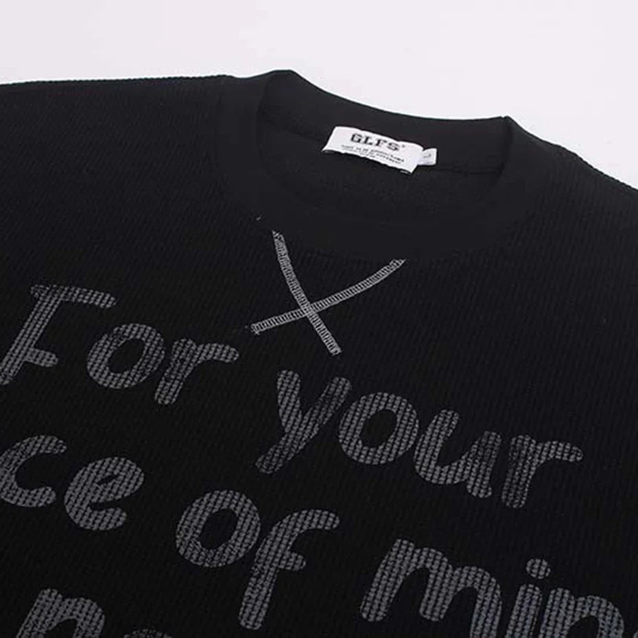 "Minimal Memory" Graphic Long Sleeve Top — dettaglio del tessuto