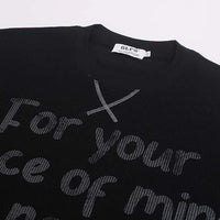 "Minimal Memory" Graphic Long Sleeve Top — dettaglio del tessuto