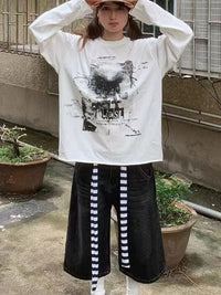 Obtuse Long Sleeve Graphic Top — vista posteriore