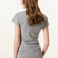 Origin 285gsm Essentials Baby Tee — dettaglio della stampa