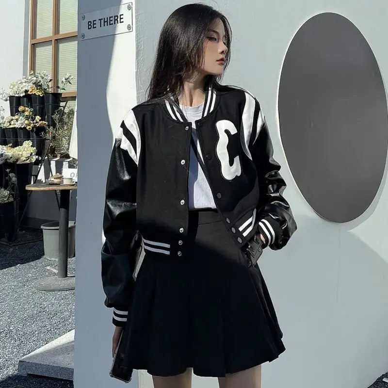 Patchwork PU Leather Black Varsity Jacket — dettaglio della stampa