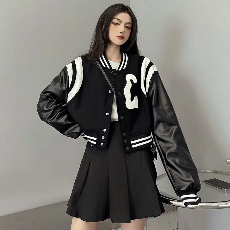 Patchwork PU Leather Black Varsity Jacket — vista laterale