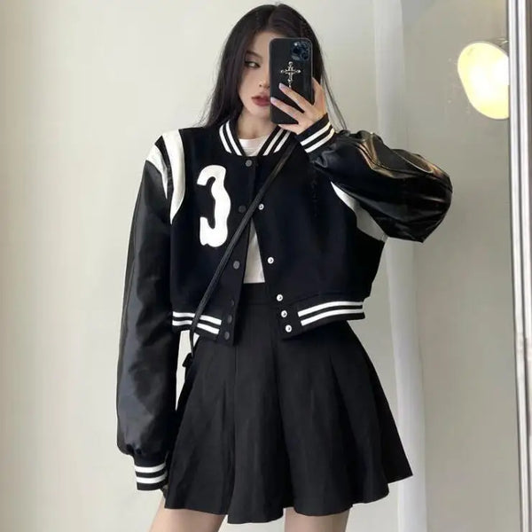 Patchwork PU Leather Black Varsity Jacket — vista frontale