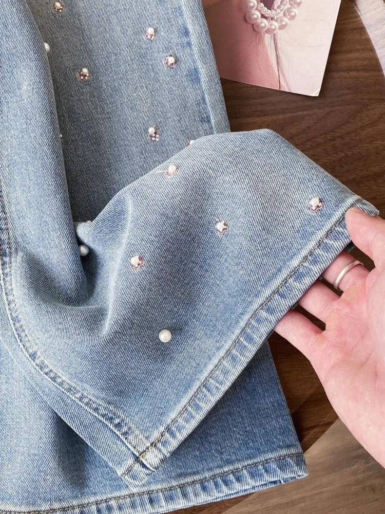 Pink Floral Embroidered Rhinestone Denim Jeans — dettaglio del tessuto
