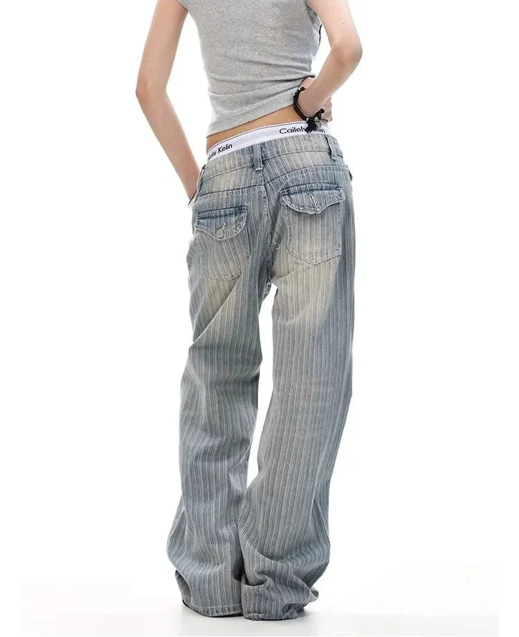 Pinstripe Micro Flared Distressed Jeans — dettaglio della stampa