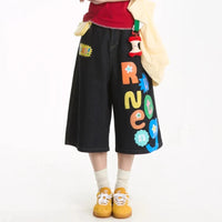 Rainbow Letter Baggy Jean Shorts Jorts — vista frontale