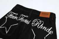 Star Letter Print Baggy Denim Curved Barrel Jeans — dettaglio della stampa