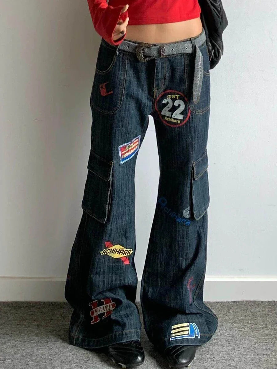 Tour Team Stamps Distressed Denim Cargo Flared Jeans — in alternativa