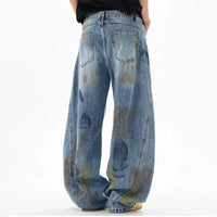 Vintage Distressed Graffiti Denim Barrel Jeans — vista laterale
