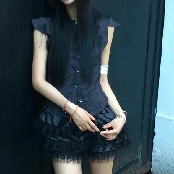 Vintage Womens Ruffled Sleeveless Blouse Shirt — in alternativa