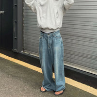 Washed Blue Streetwear Boot Cut Baggy Jeans — dettaglio del tessuto